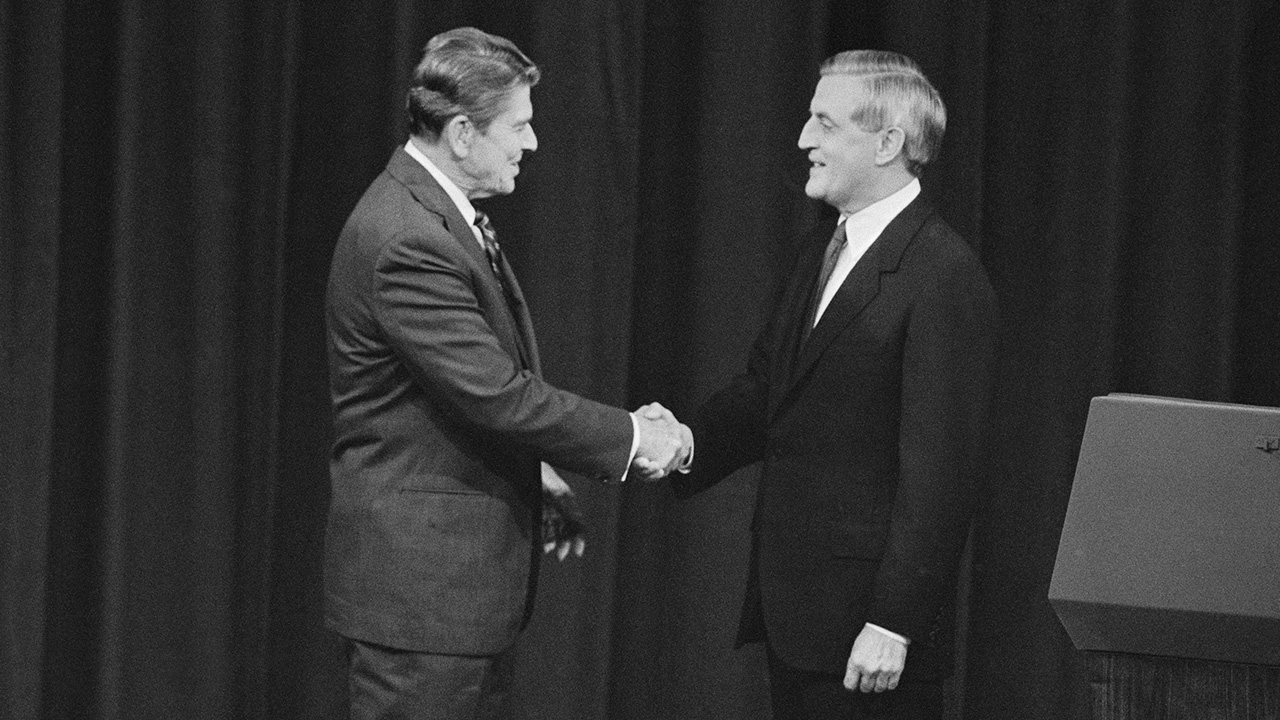 President Reagan and Democratic candidate for President, Walter Mondale, shake hands as they greet one another before the start of their debate in Louisville, Ky on Oct. 7, 1984.